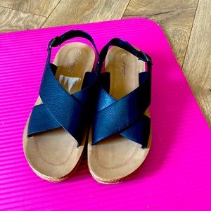 Black, light wedge style sandals. New without tags